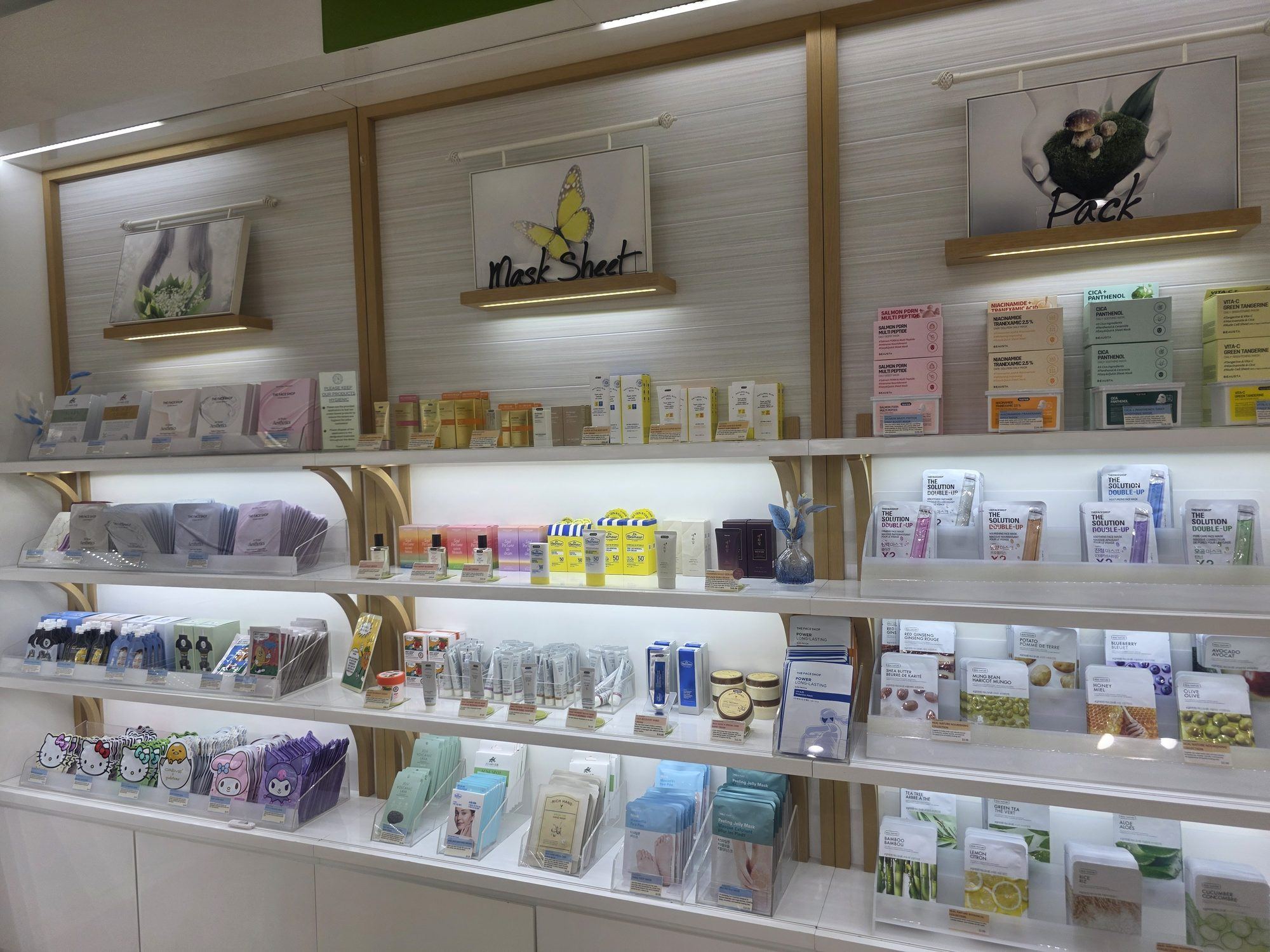 Evenly lit shelves of Korean skincare products